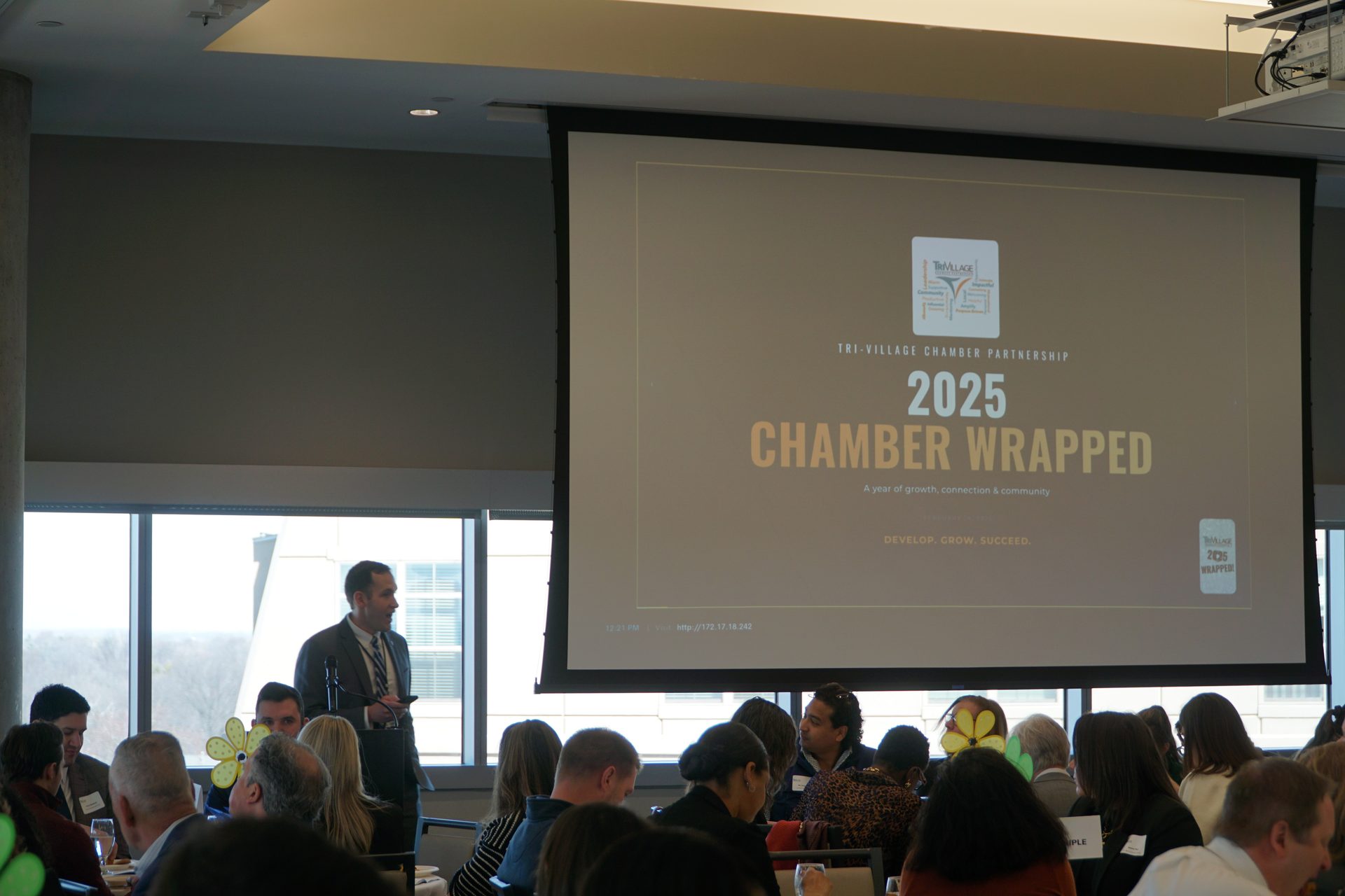 Full room at the TVCP Annual Meeting with Joe Lotozo at the podium and Chamber Wrapped slides on screen