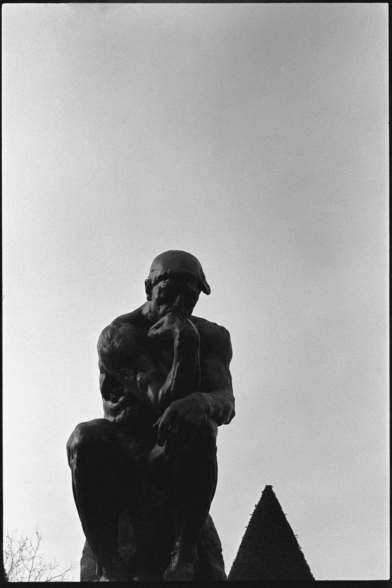 Rodin's The Thinker against a winter sky — Ilford HP5