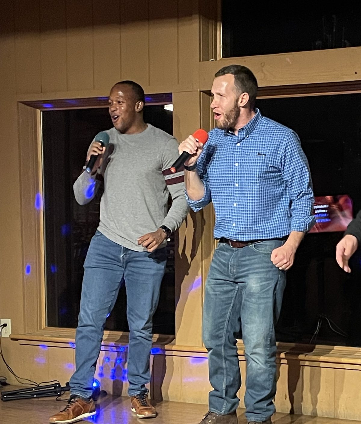 Joe Lotozo and Uncle Robbie singing karaoke at Camp Paquita